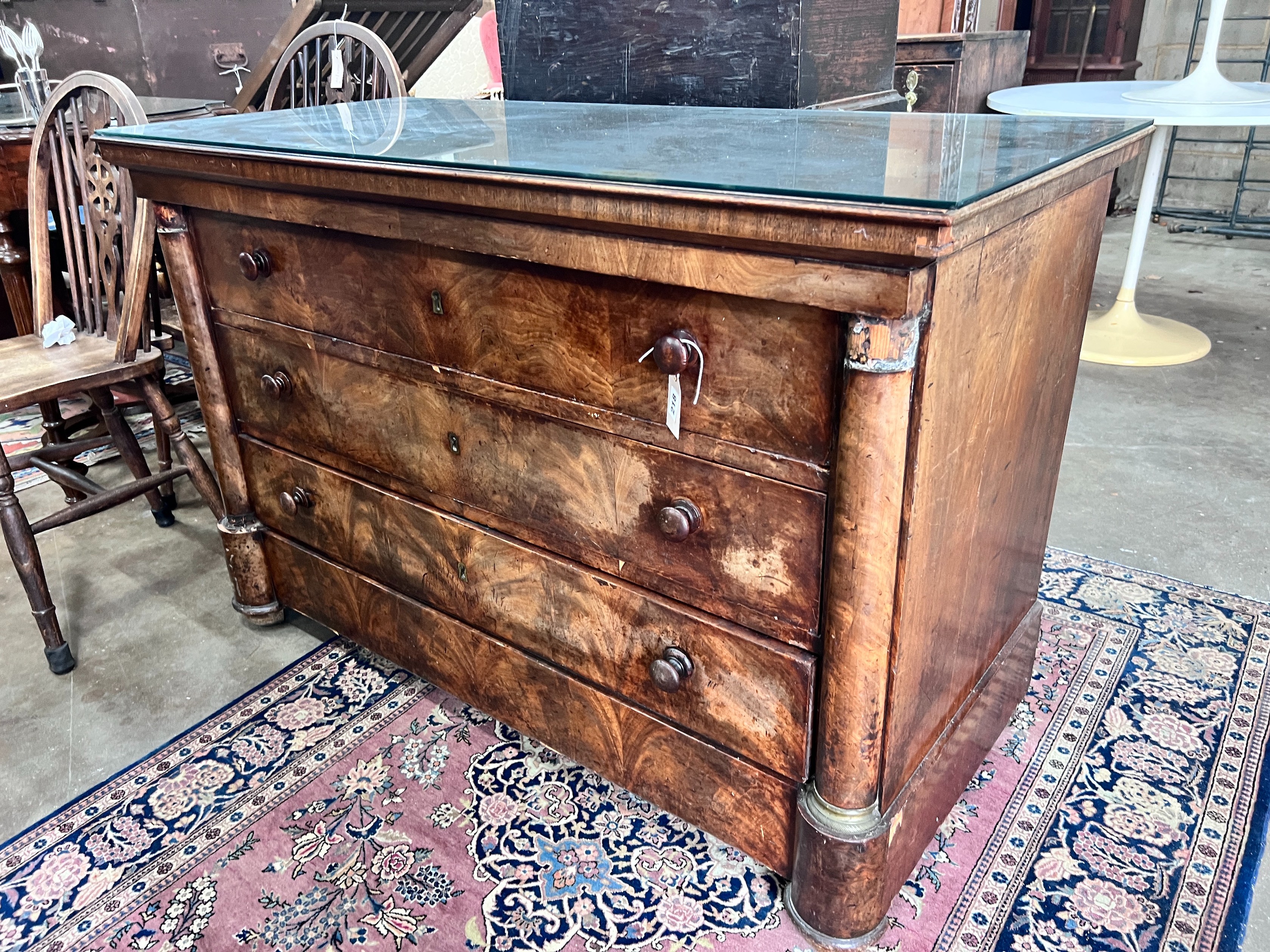 A 19th century French mahogany commode, fitted four long drawers, width 130cm, height 85cm *Please note the sale commences at 9am.